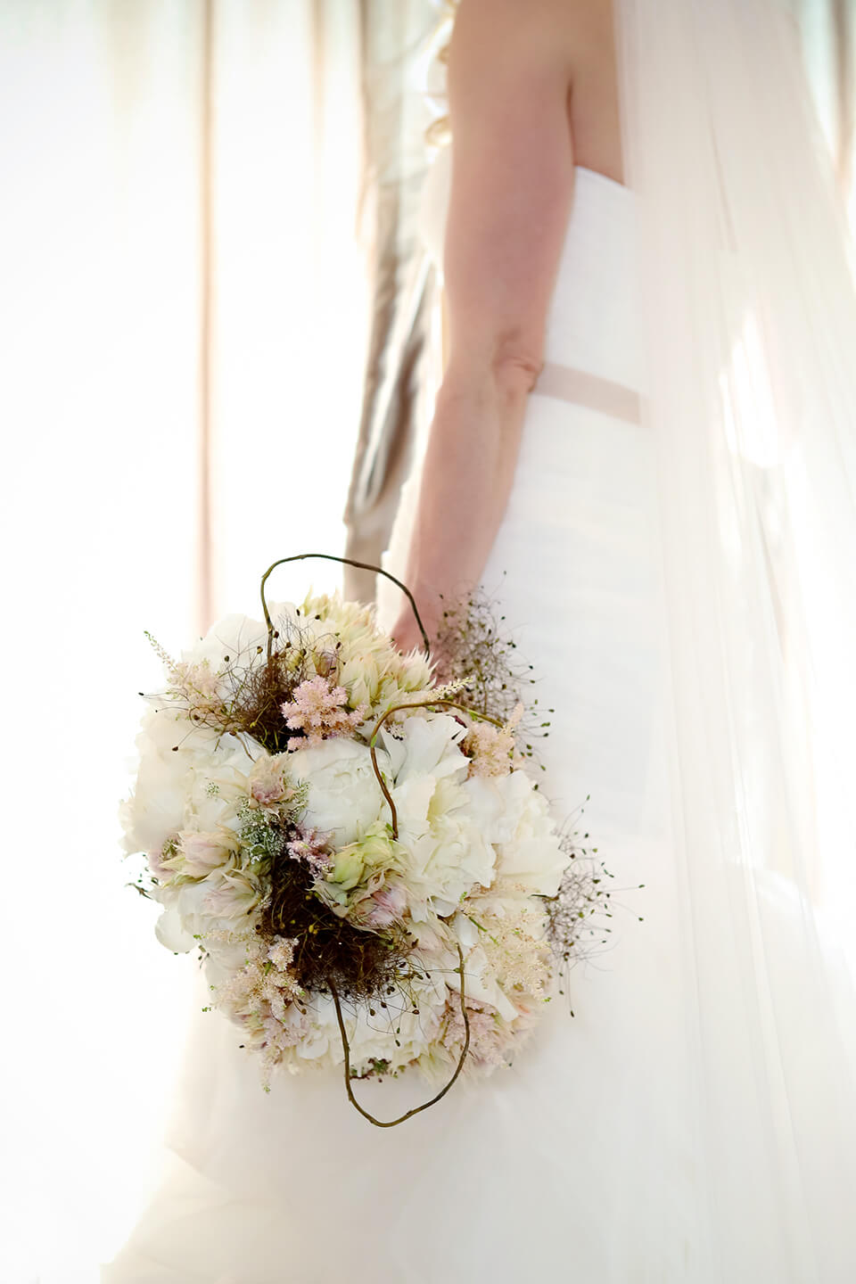 Bride with bouquet.